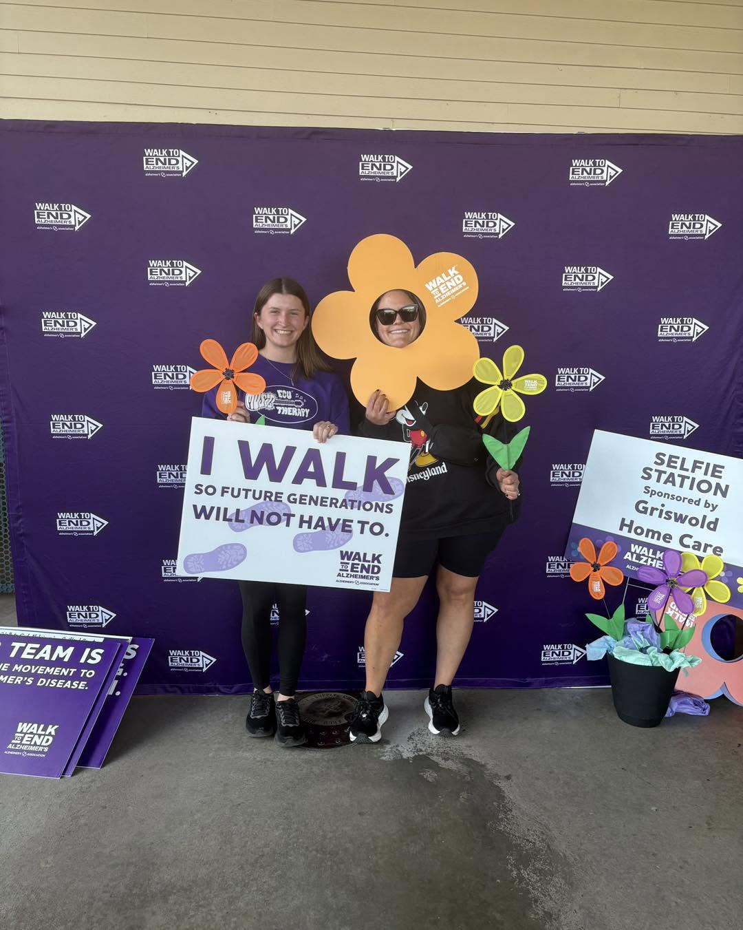 Teammates at the Walk to End Alzheimer's selfie station